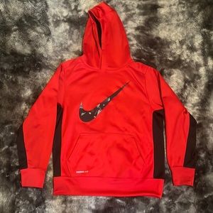 Red Nike sweatshirt with camouflage Nike logo